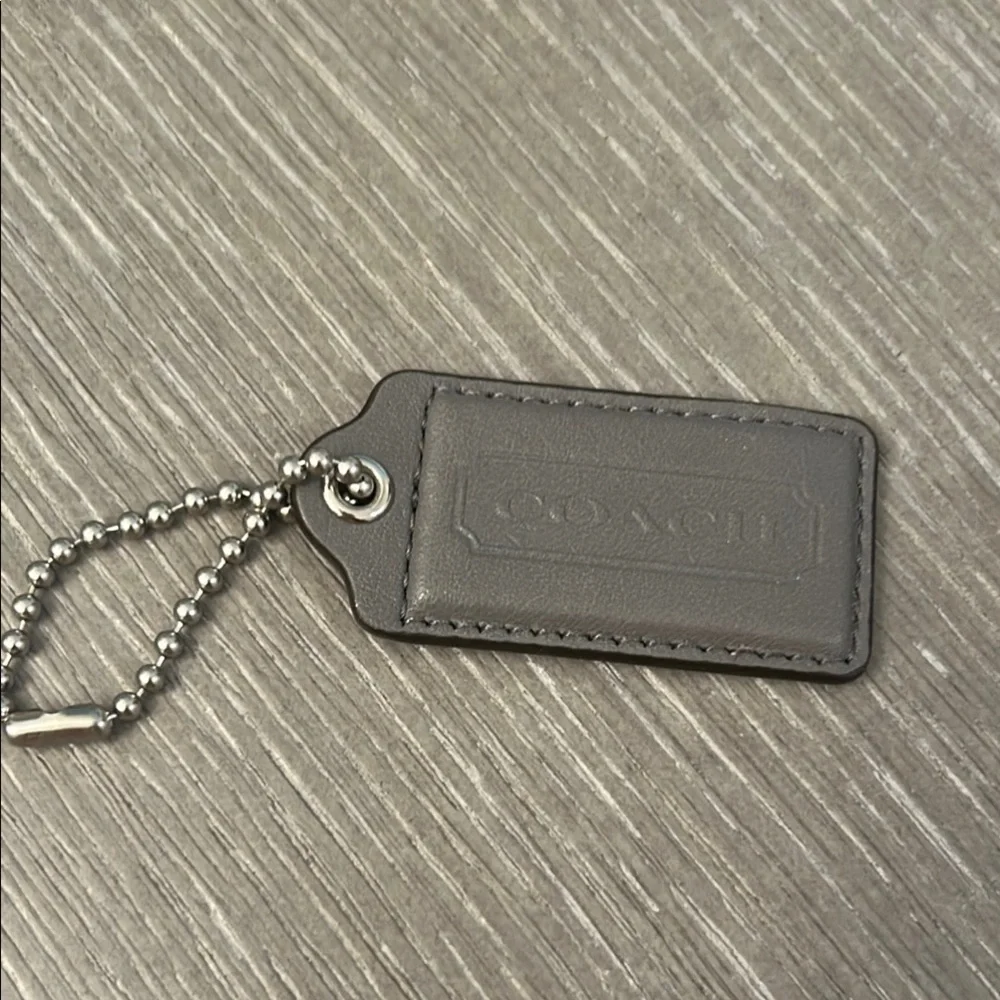 Coach Gray Leather purse tag